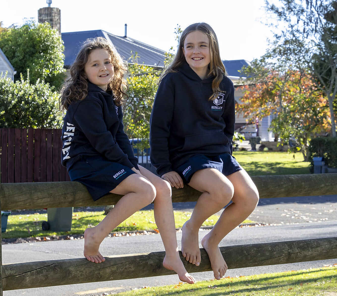 Two Berkley Students Stand Together Outside