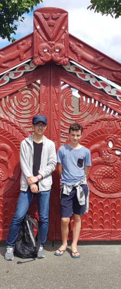 Student in Front of a Gate