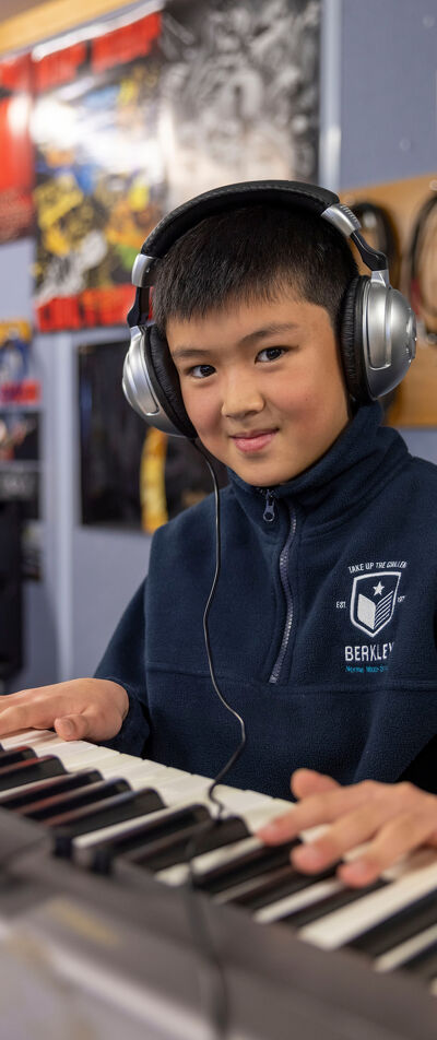 Absence Student Playing an Electronic Keyboard